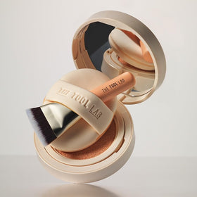 The Tool Lab All Day Cover Duo foundation brush delivers even coverage for liquid formulas.