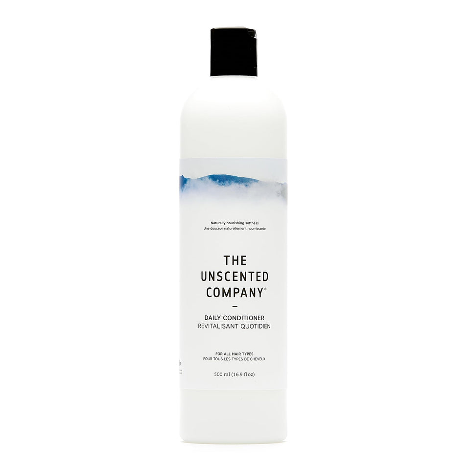 The Unscented Company Daily Conditioner bottle being poured for fragrance-free hydration and detangling