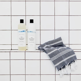 The Unscented Company Daily Shampoo applied to wet hair for a clean feel