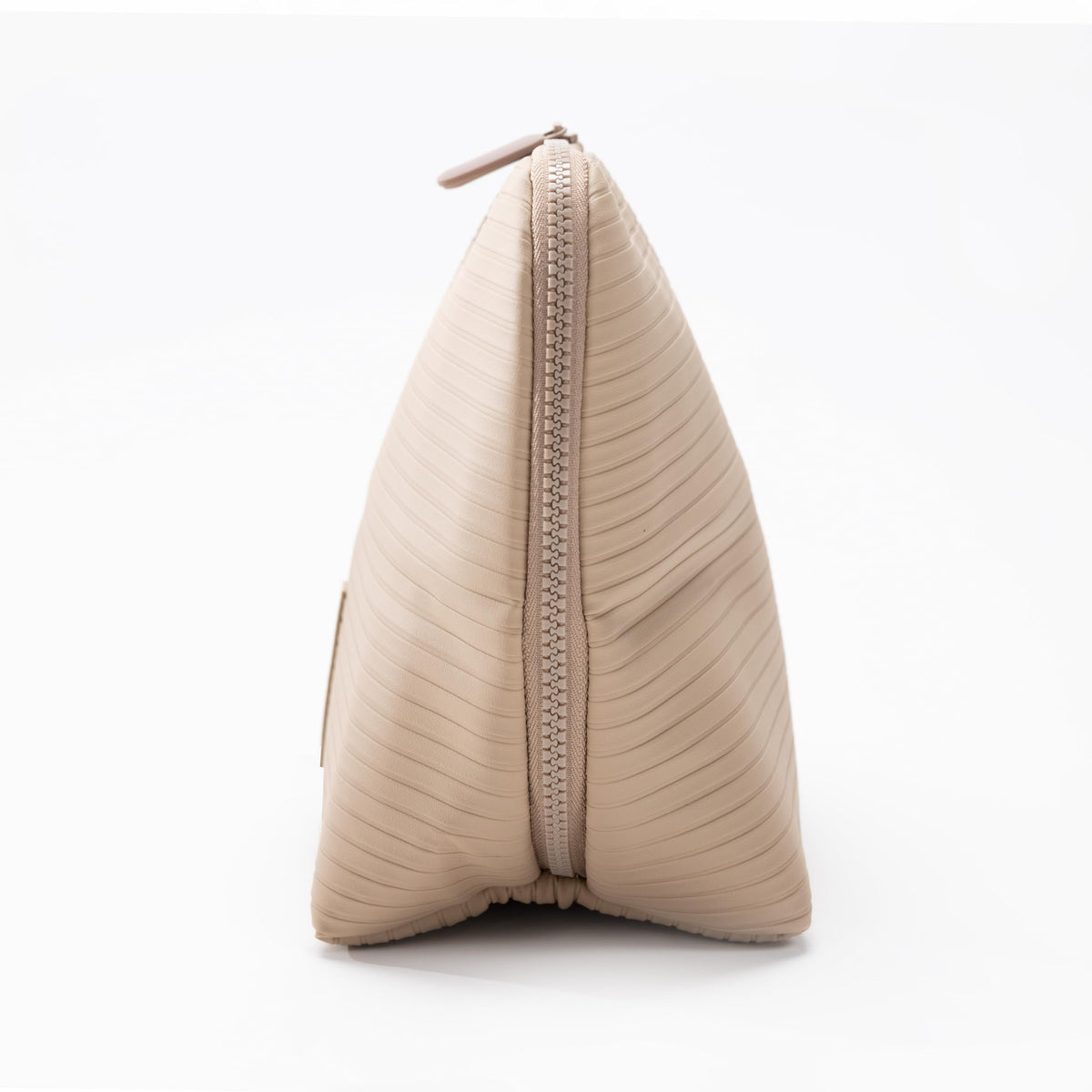 The Verti carry-on friendly design in sandstone fits bags and planes easily