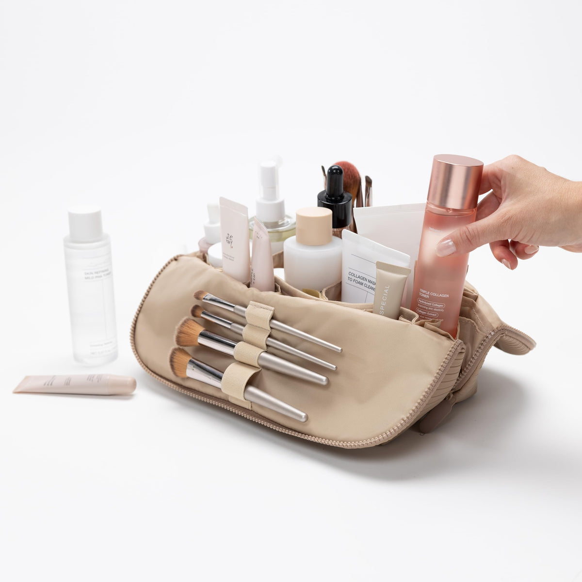 The Verti vanity stand-ready organizer in sandstone keeps essentials visible