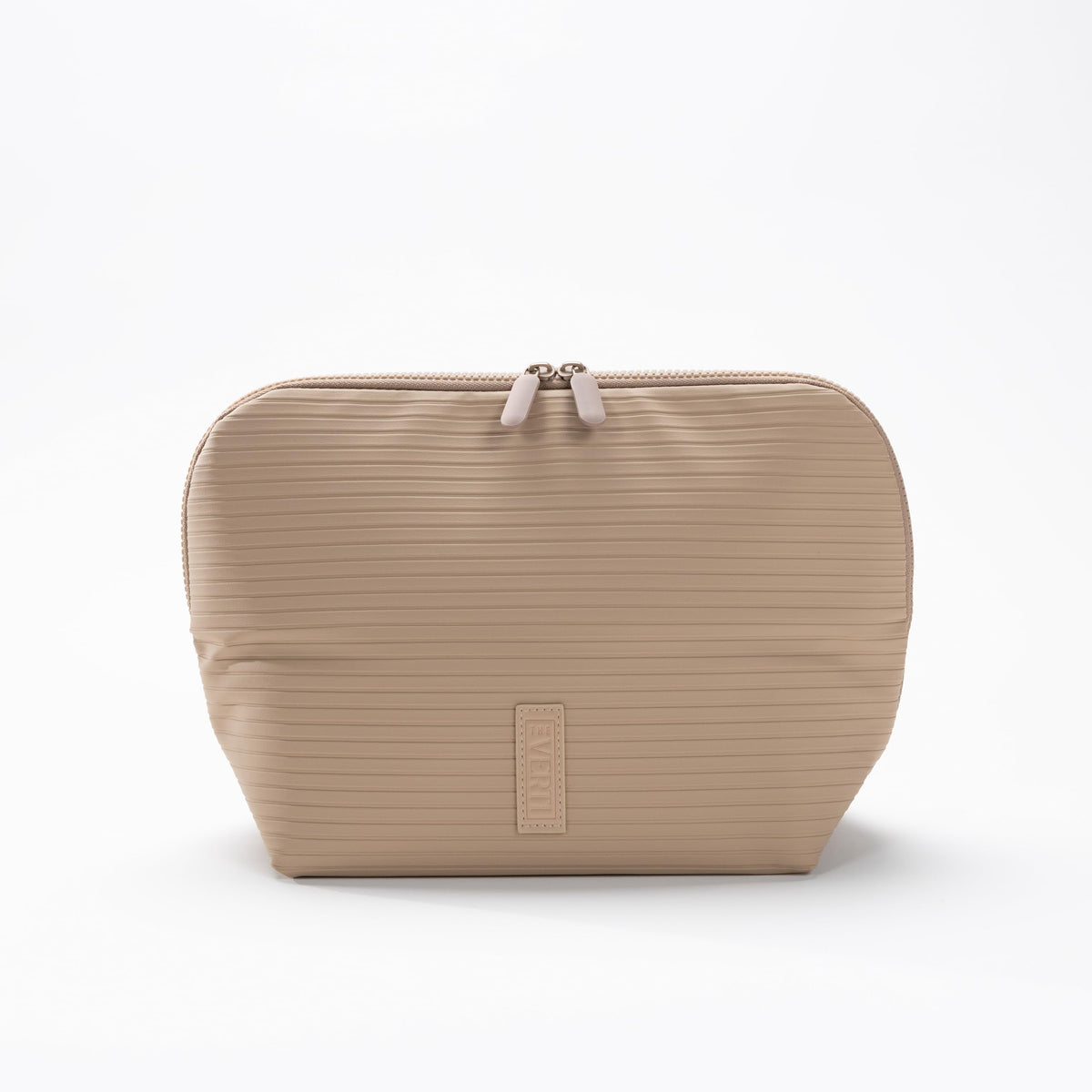 The Verti waterproof fabric in sandstone protects contents during travel and spills