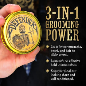 The Vintage Grooming Co Defender mustache guard clip demonstrates secure, spill-free drinking.