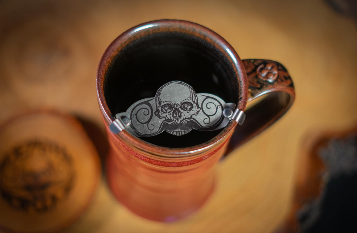 The Vintage Grooming Co Defender mustache guard drinking protection during coffee or cocktails.