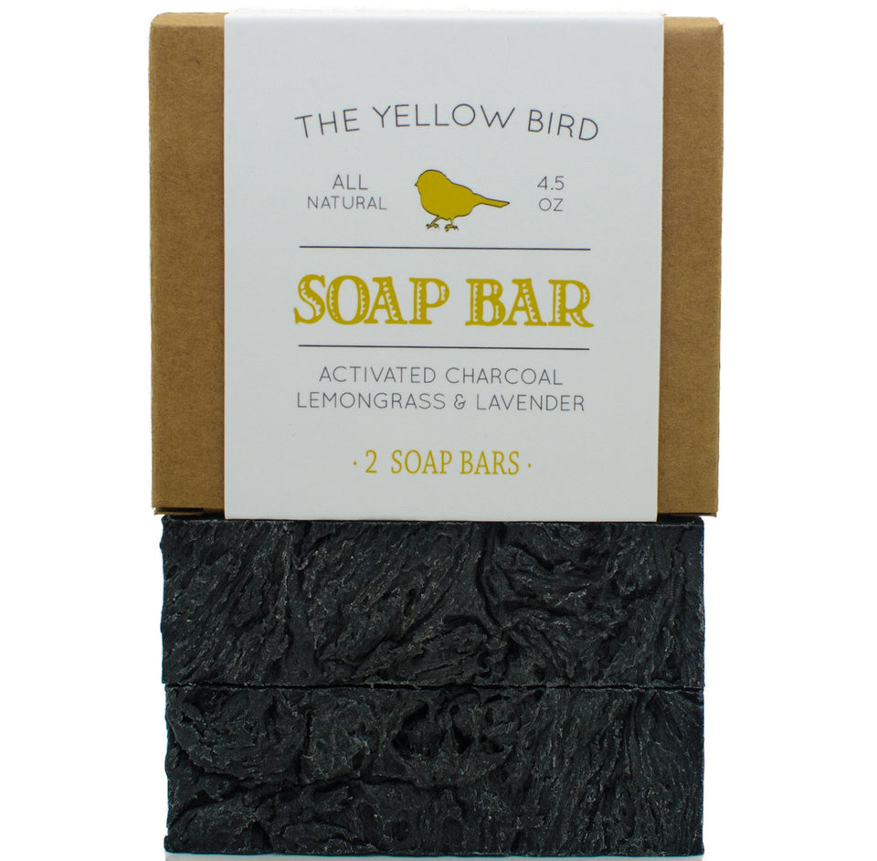 The Yellow Bird charcoal soap for face shows a cleansing ritual for clear-looking skin.
