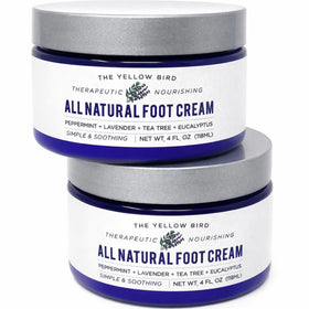 The Yellow Bird Foot Cream bottle close-up showing organic ingredients for deep hydration.