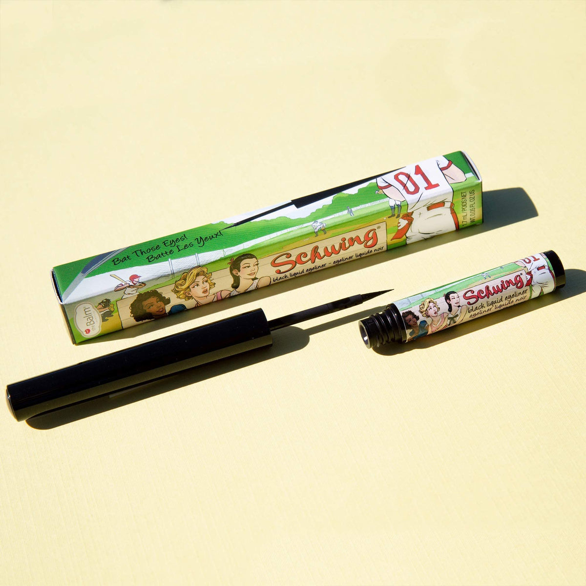 theBalm Schwing swatch shows rich matte payoff on skin.