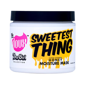 The Doux Sweetest Thing Honey Moisture Mask applied to damp curls for deep hydration and detangling.
