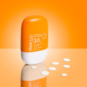 Thinkdaily SPF 30 texture close-up reveals lightweight mineral serum.