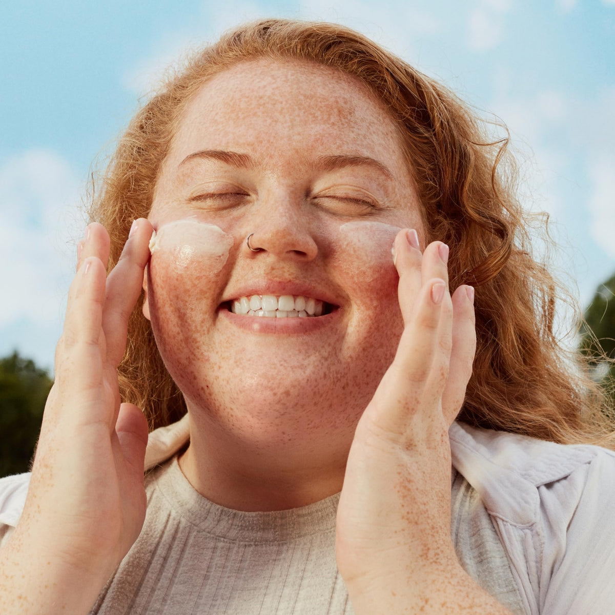 Three Ships cream on face during application suggests smooth, quick absorption.