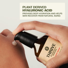 Thrive Natural Care Hyaluronic Acid glow close-up highlights hydration and plumpness.