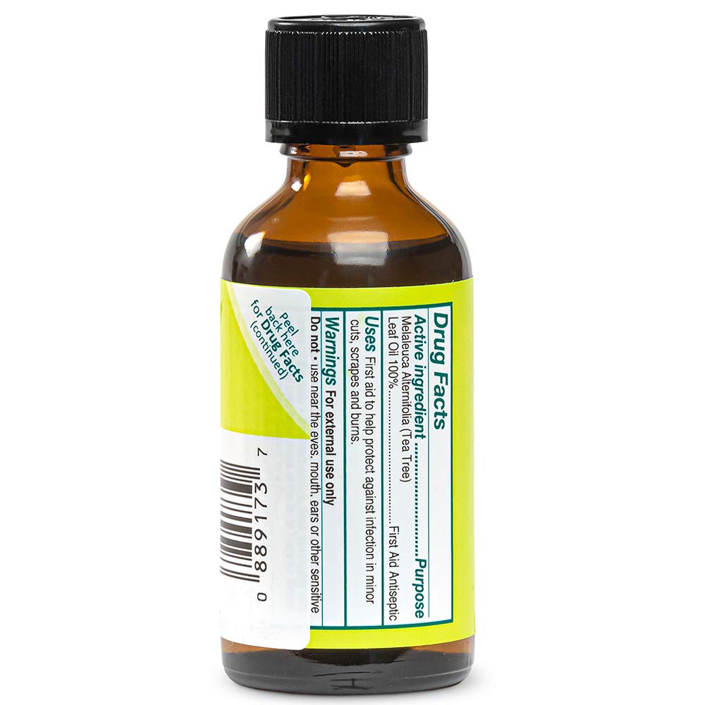 Dropper with Tea Tree Oil ready for precise topical use by Thursday Plantation.