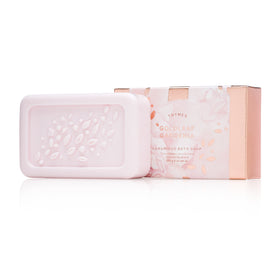 Thymes Goldleaf Gardenia soap bar close-up showing creamy moisture.