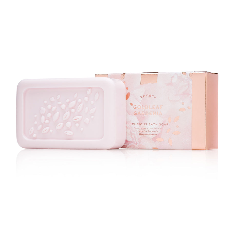 Thymes Goldleaf Gardenia soap bar close-up showing creamy moisture.