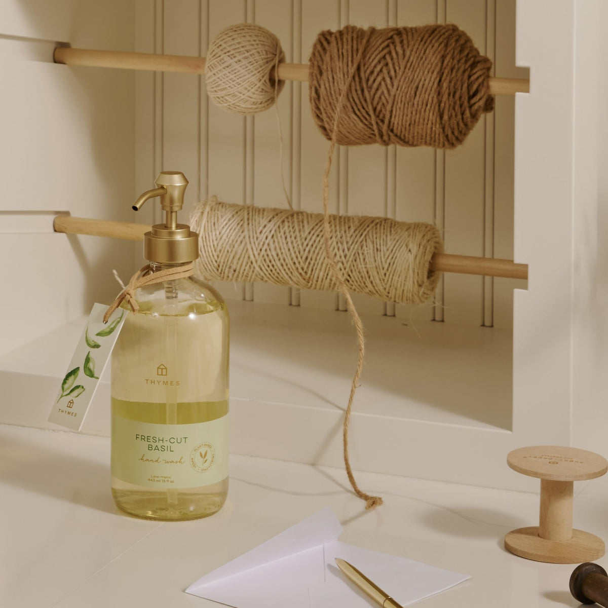 Thymes Hand Wash Fresh-Cut Basil lather demonstrates a refreshing cleansing experience.