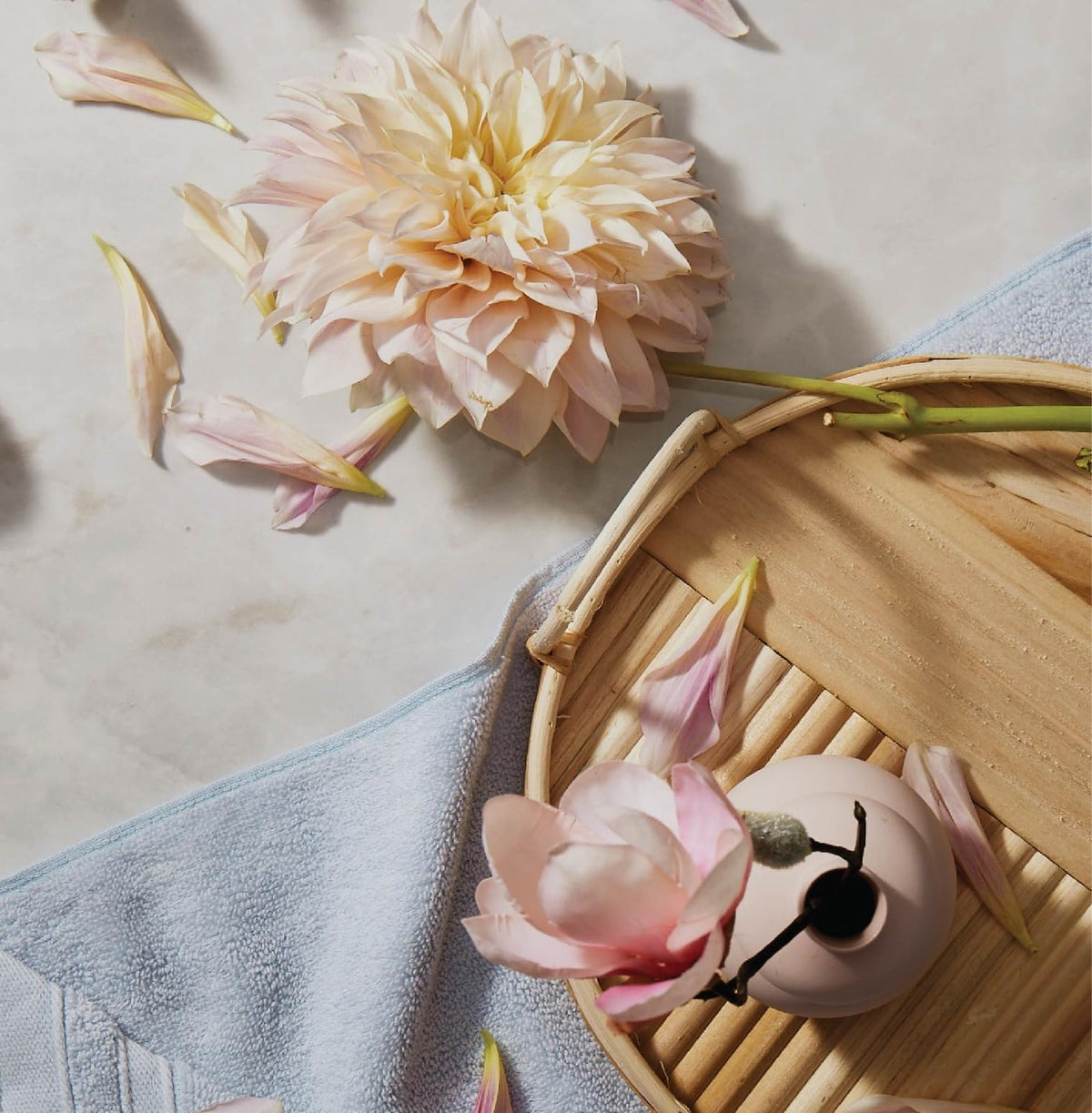 The Thymes Kimono Rose floral bouquet scene suggests gift-ready appeal.