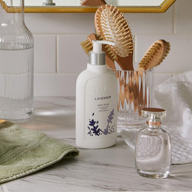 Thymes Lavender rosewood-note close-up with warm, earthy undertones.