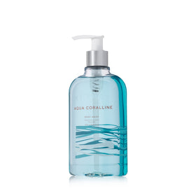 Thymes Moisturizing Body Wash pump bottle with Aqua Coralline scent for a refreshing cleanse.
