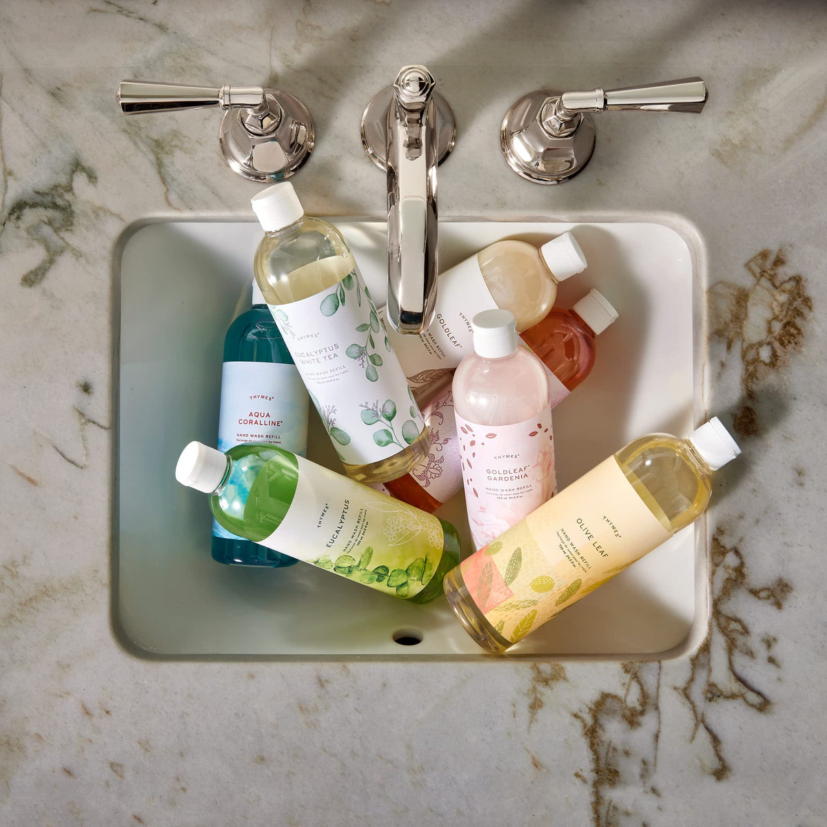 Thymes Washed Linen refill liquid close-up reveals citrus and amber notes