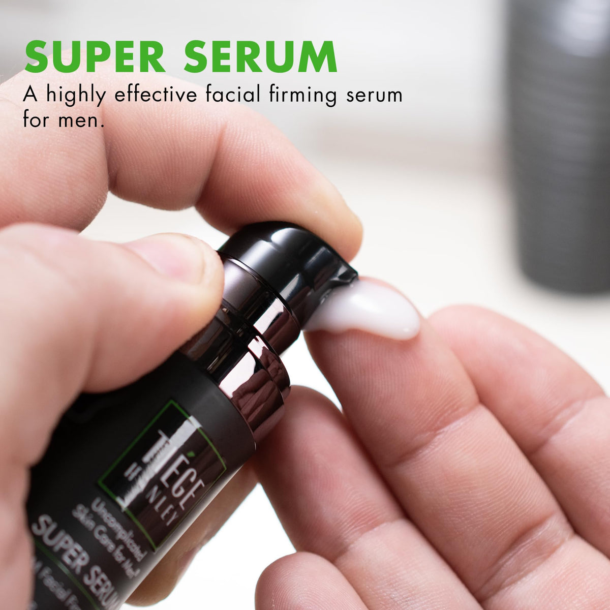 Tiege Hanley anti-aging serum pump close-up showing easy, controlled dispensation.