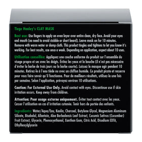 Tiege Hanley clay mask being spread on clean skin for thorough purification.