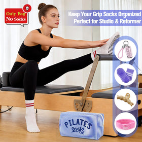 TIFFYONEK striped seersucker pouch with upright design beside reformer