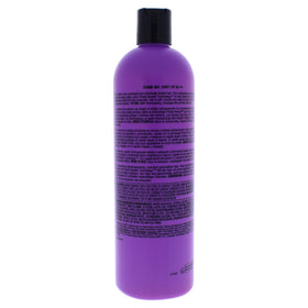 Close-up of TIGI Bed Head Dumb Blonde Reconstructor label for conditioning and repair.