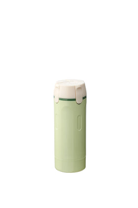 Tilanneo 4-in-1 travel pump bottle in Key Lime for easy on-the-go organization.
