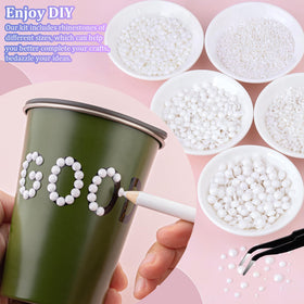 TINKRSTUFF rhinestones pickup pen helps lift gems with ease.