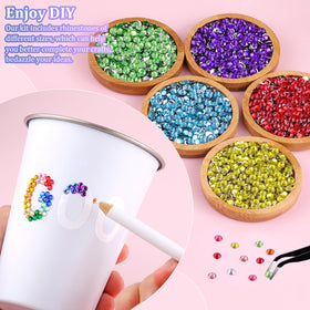TINKRSTUFF pickup pen aids accurate gem positioning.