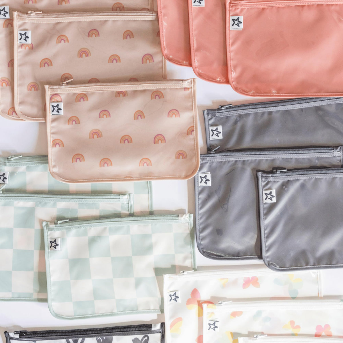 Tiny Twinkle 3-pack pouches inside a diaper bag demonstrate organization.