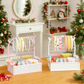 TIPSYTREE side pegs holding hair ties within reach to reduce clutter
