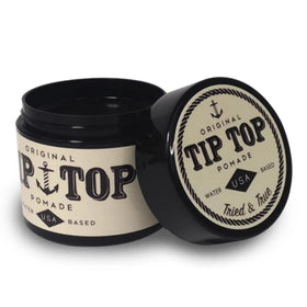 TipTop Original Pomade closeup demonstrating smooth texture for versatile styling.