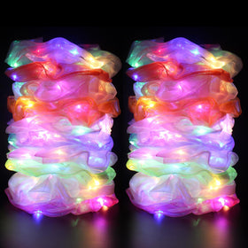 TIZAPIB LED scrunchies glow in the dark for bold night-out looks.