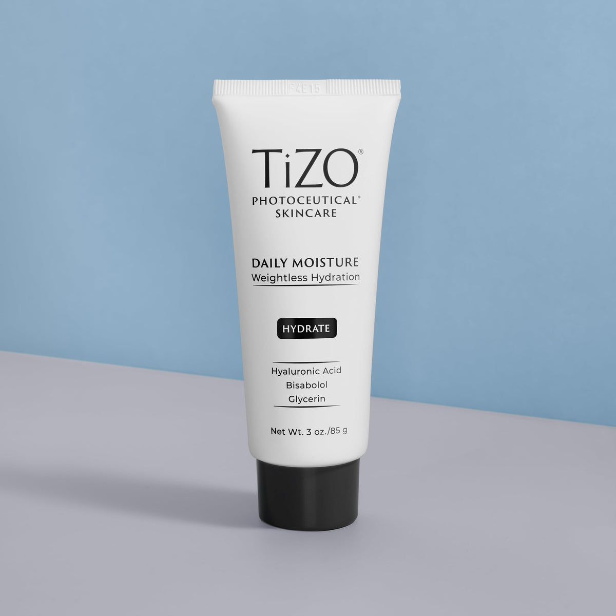 Cream swirl on skin from TIZO Daily Moisture, illustrating quick absorption