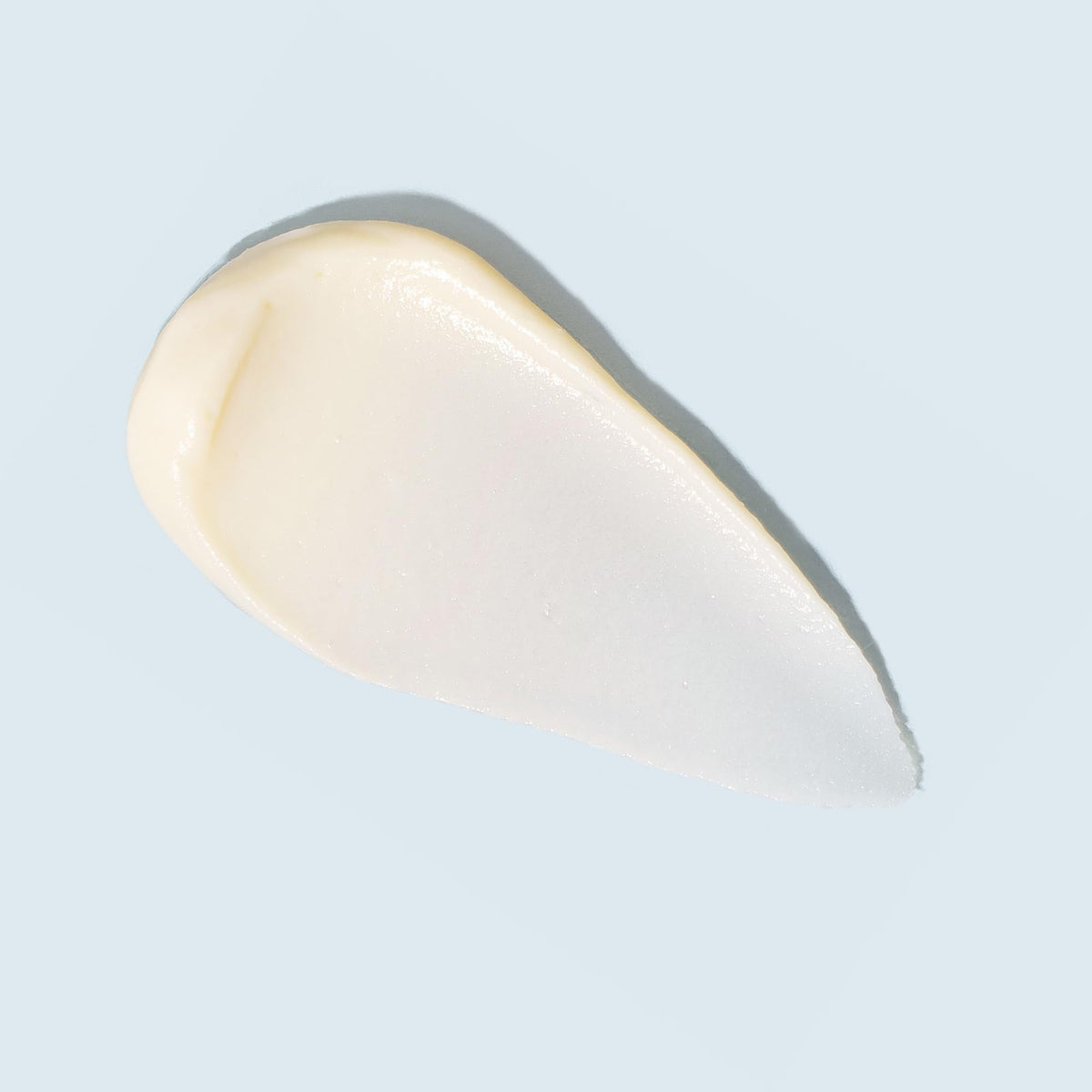 TIZO Eye Renewal silky cream texture offering a smooth, invisible finish near the eye area.
