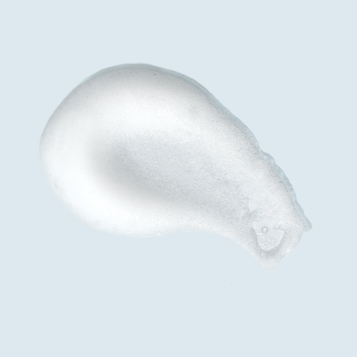 TIZO Photoceutical Foaming Cleanser foamy lather on skin for gentle cleansing.