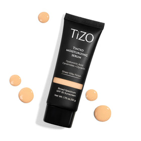 Packaging shot of TIZO tinted moisturizing serum compact highlighting travel-friendly design