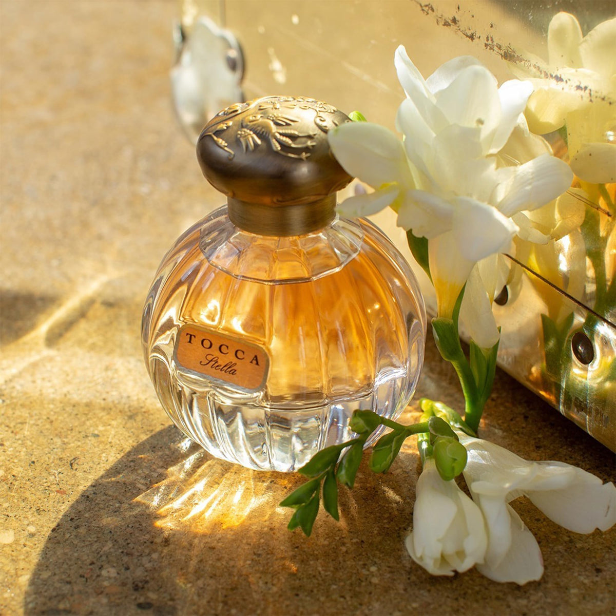 Tocca Stella spritz on wrist for quick freshness on the go.