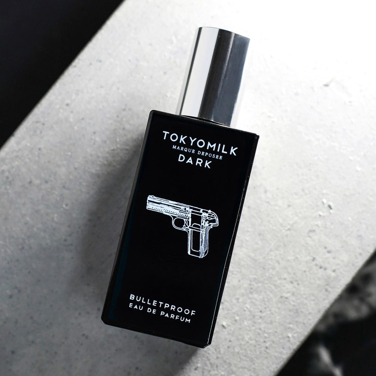 TOKYOMILK Dark Bulletproof packaging with color pop interior.
