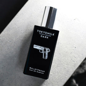 TOKYOMILK Dark Bulletproof packaging with color pop interior.