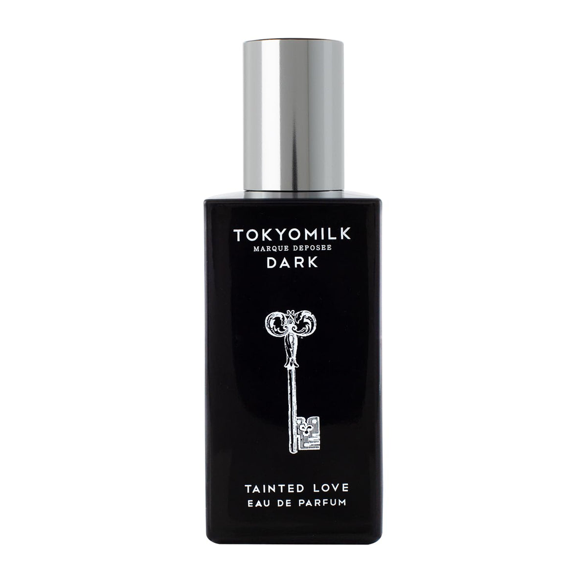 TOKYOMILK Dark Tainted Love bottle on a reflective surface, bold evening scent