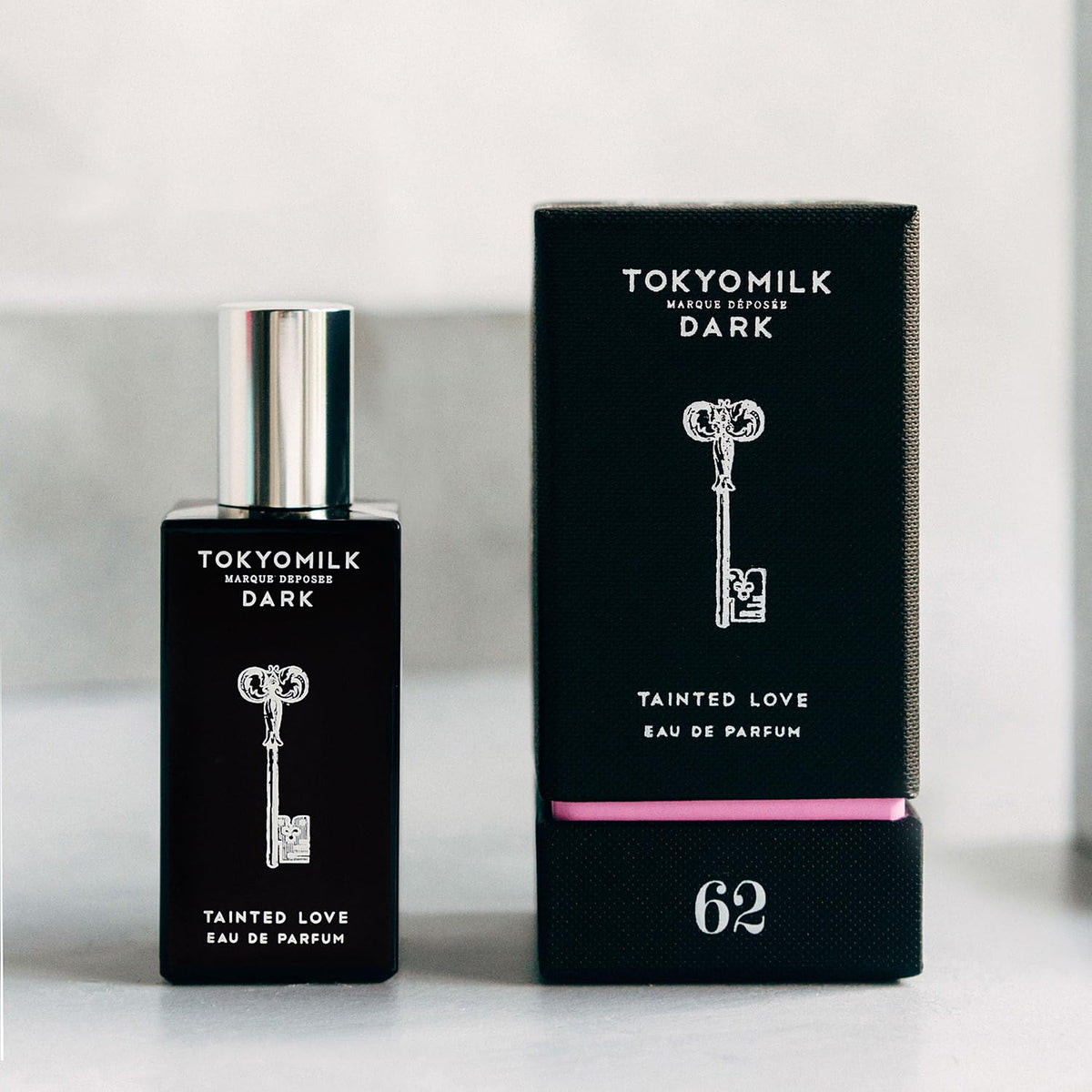 TOKYOMILK Dark Tainted Love packaging with sleek black design and color pop