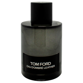 Tom Ford Eau Dombre Leather spray on wrist suggests long-lasting evening wear.