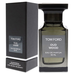 Tom Ford Oud Wood in-use spray captures warmth and versatility for evening or day