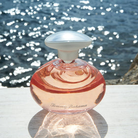 Tommy Bahama Eau de Parfum bottle front view showcases sleek design and premium fragrance.