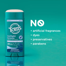 Fragrance notes include ylang-ylang, mandarin, and tonka.