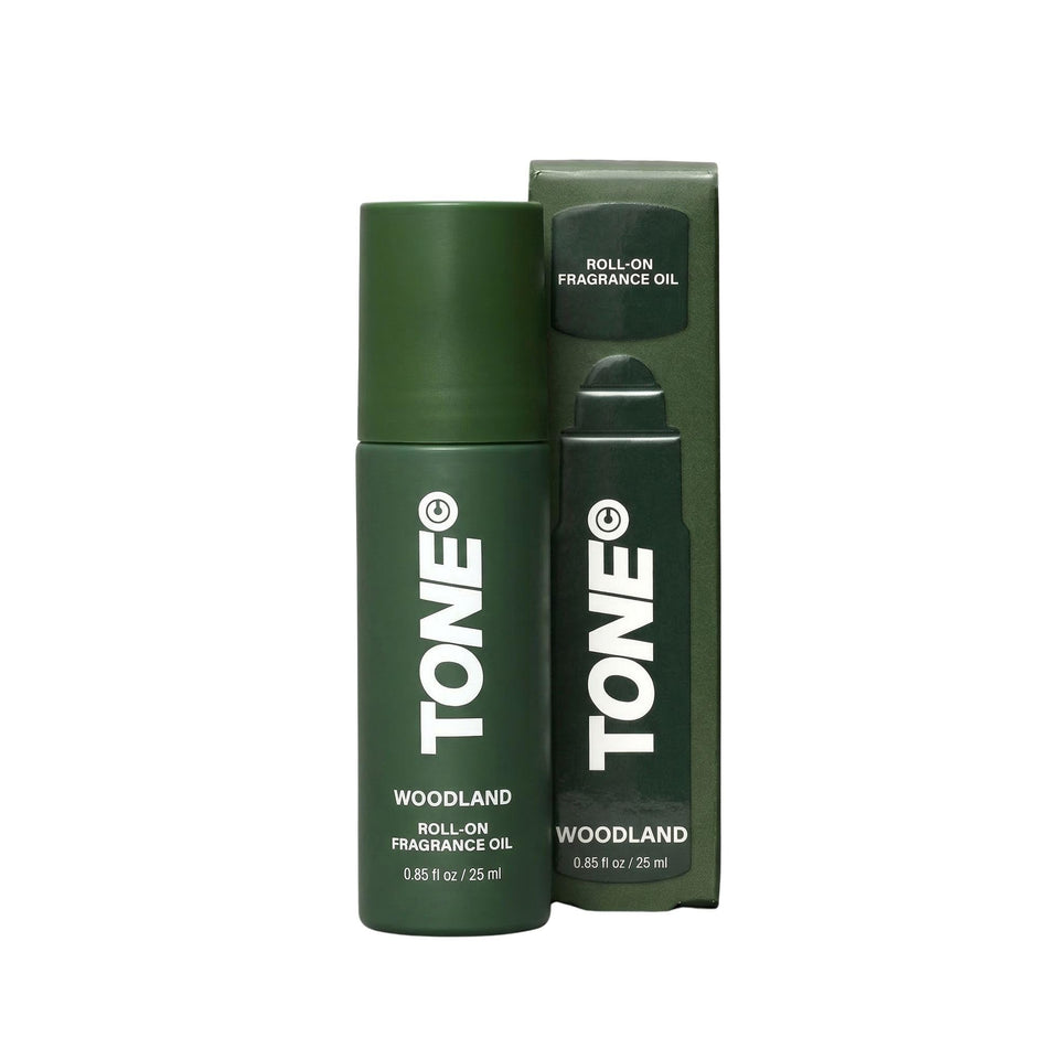 TONE Exclusive Woodland roll-on bottle close-up shows a long-lasting fragrance.
