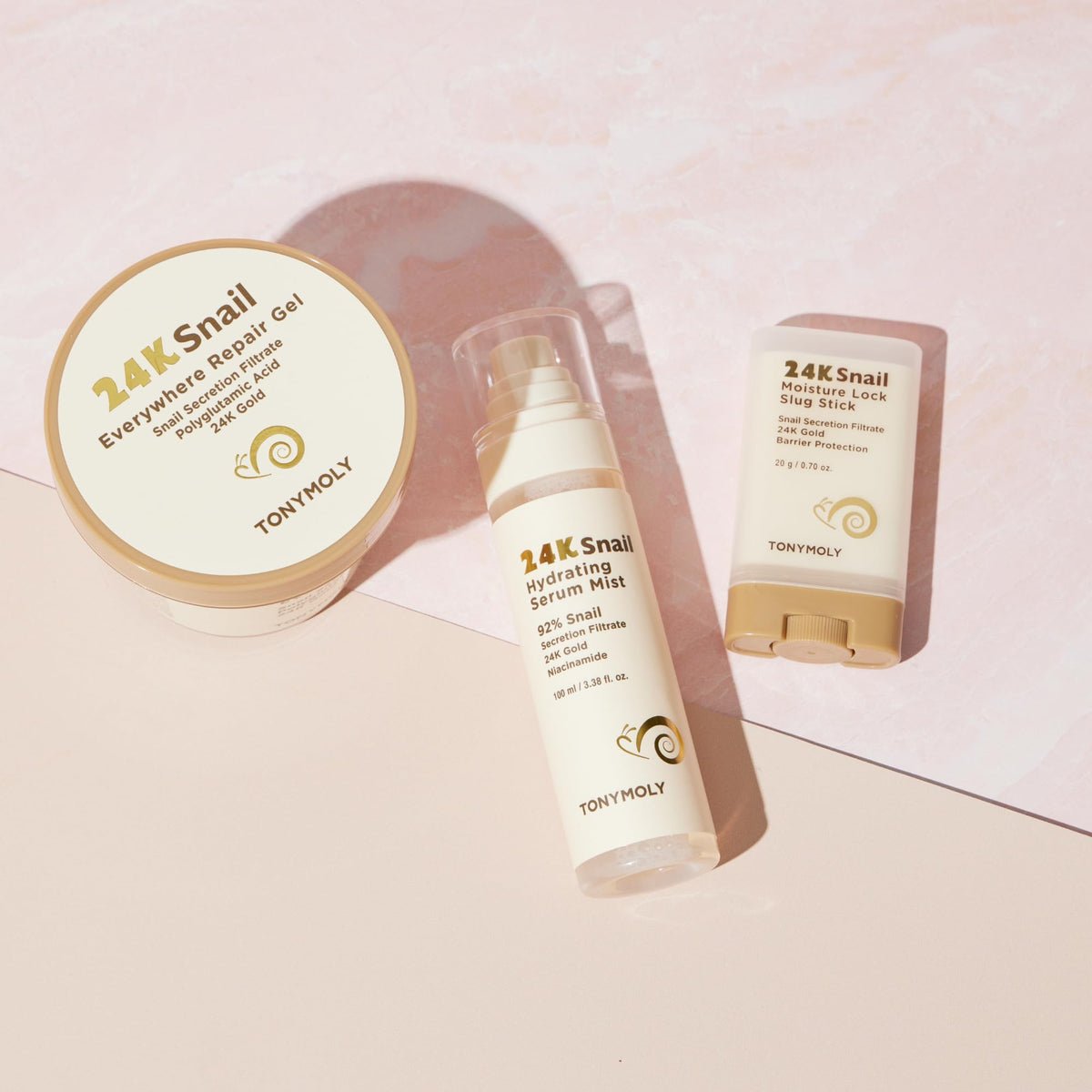 TONYMOLY 24K Snail Hydrating Serum Mist packaging with gold accents.