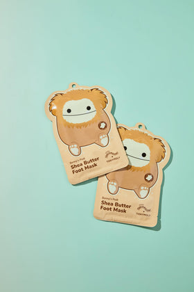 TONYMOLY Benny Shea Butter Foot Mask bootie at-home spa experience delivers relaxing hydration.